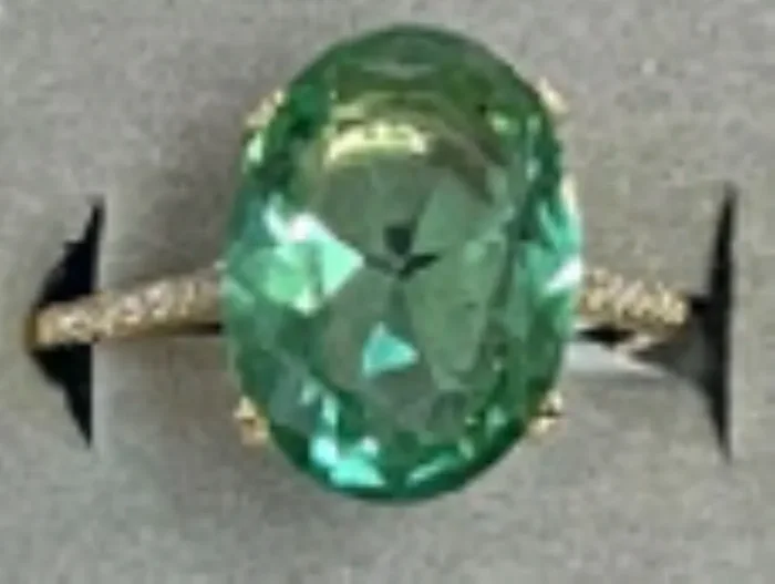 City by City Gold Ring With a Large Oval Green Crystal and Cubic Zirconia Pave Band